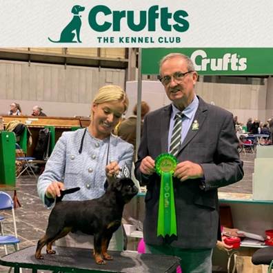 En bild som visar person, klädsel, person, Hundras
Automatiskt genererad beskrivning